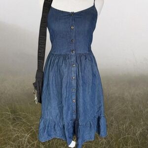 Blue denim midi dress with button-down front, ruffled hem, and elastic back.